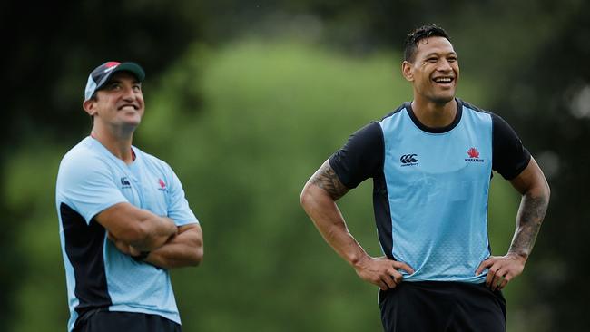 Waratahs coach Daryl Gibson and Israel Folau smile during a training session.
