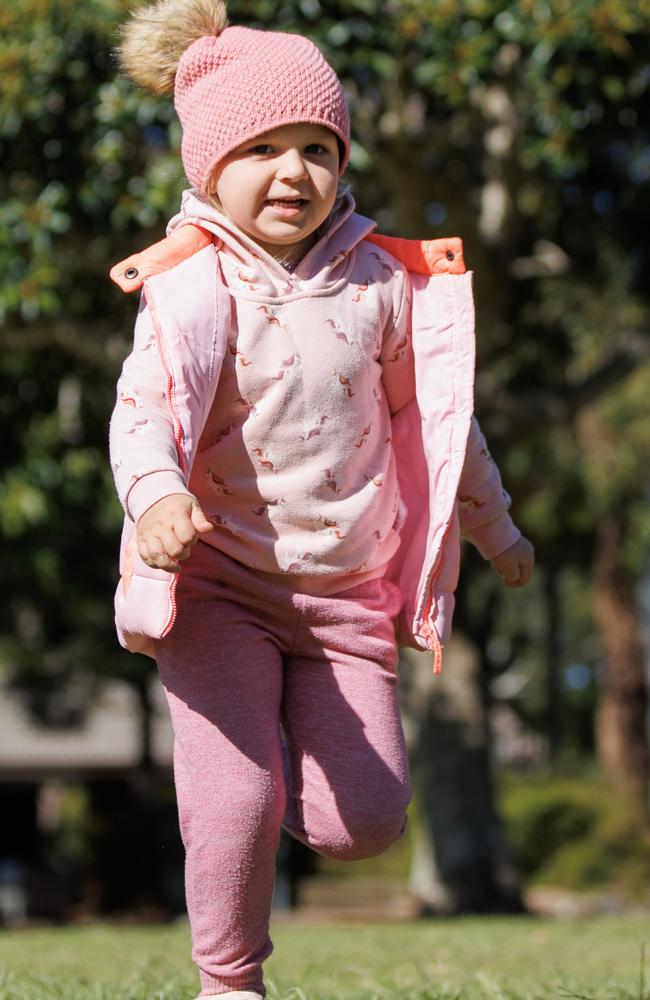 Raffi Smith-Rogers, 5, rugs up against the cold at Noosaville. Picture Lachie Millard