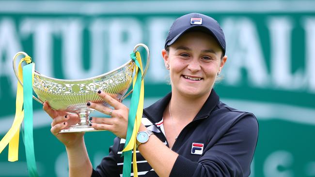 Ashleigh Barty with the Birmingham Classic trophy after reaching world No 1