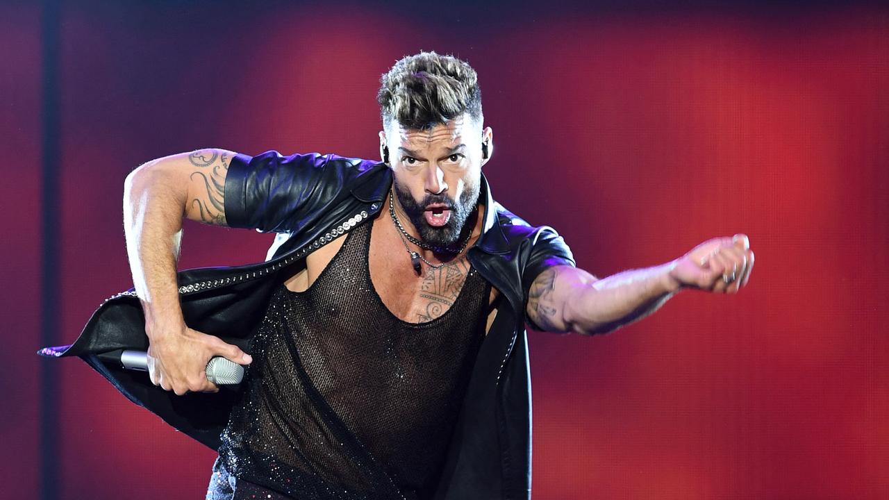 Ricky Martin performs during the Movimiento Tour show at the Antel Arena, in Montevideo (Photo by Pablo PORCIUNCULA / AFP)