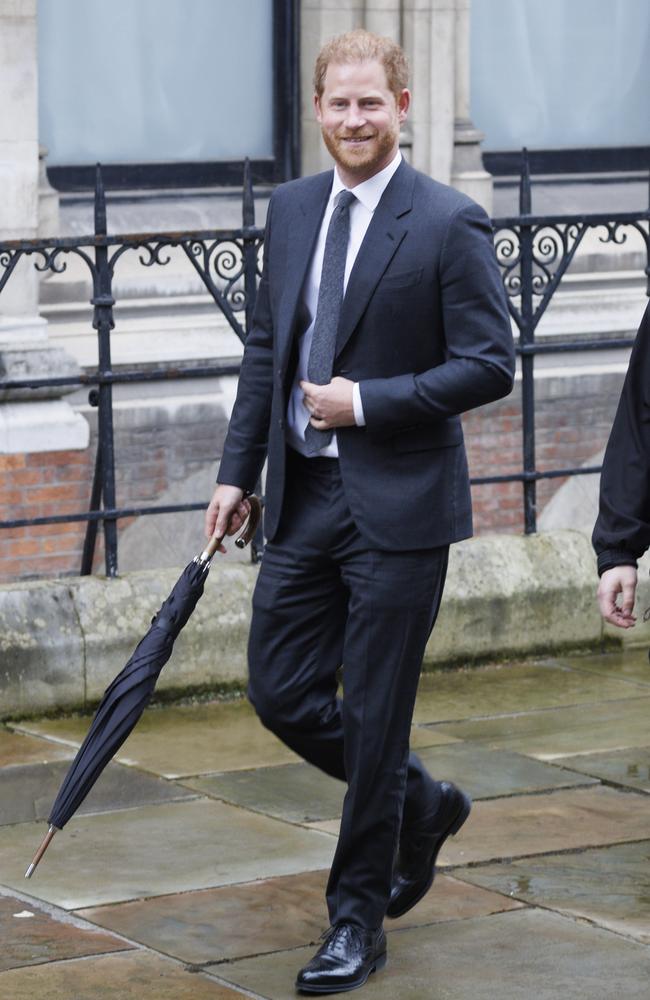 He smiled at those waiting outside as he left court on Tuesday. Picture: Belinda Jiao/Getty Images