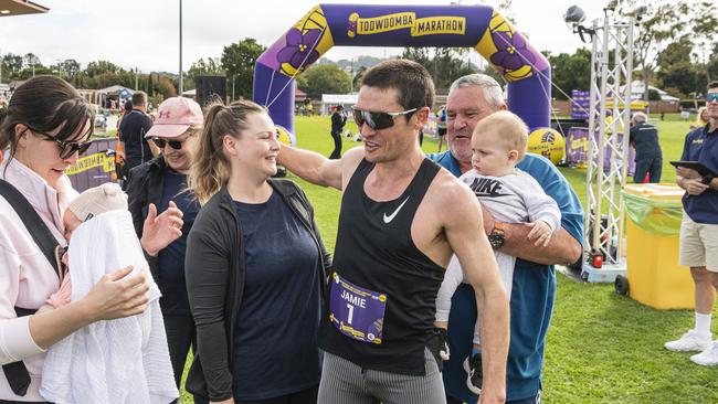 Toowoomba Marathon winner Jamie Lacey with family including wife Kristy and son Jackson after the race, Sunday, May 5, 2024. Picture: Kevin Farmer