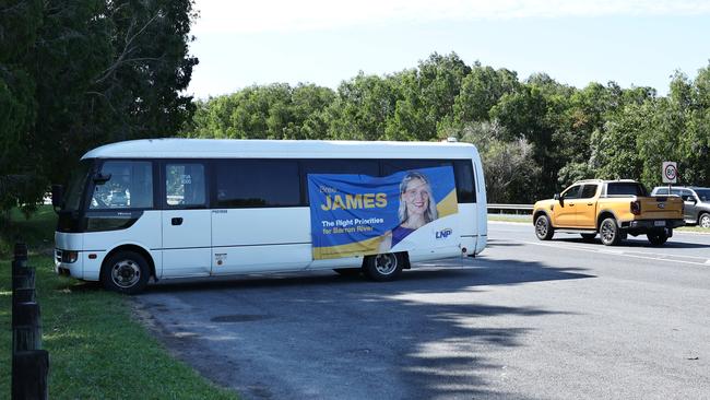 LNP candidate for Barron River Bree James has one of her large election signs displayed on the side of a bus, parked perpendicular to the Captain Cook Highway at the Fruit Bat pit stop at Aeroglen. Picture: Brendan Radke