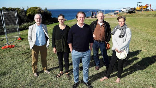 Founding director of Sculpture by the Sea David Handley (middle), pictured with artists, has accused Waverley Council of not supporting the popular event. Picture: Tim Hunter.