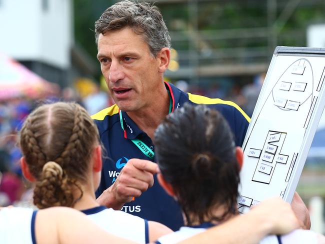 BRISBANE, AUSTRALIA - FEBRUARY 08: Crows Coach Matthew Clarke talks to his team during the round one AFLW match between the Brisbane Lions and the Adelaide Crows at Hickey Park on February 08, 2020 in Brisbane, Australia. (Photo by Jono Searle/Getty Images)