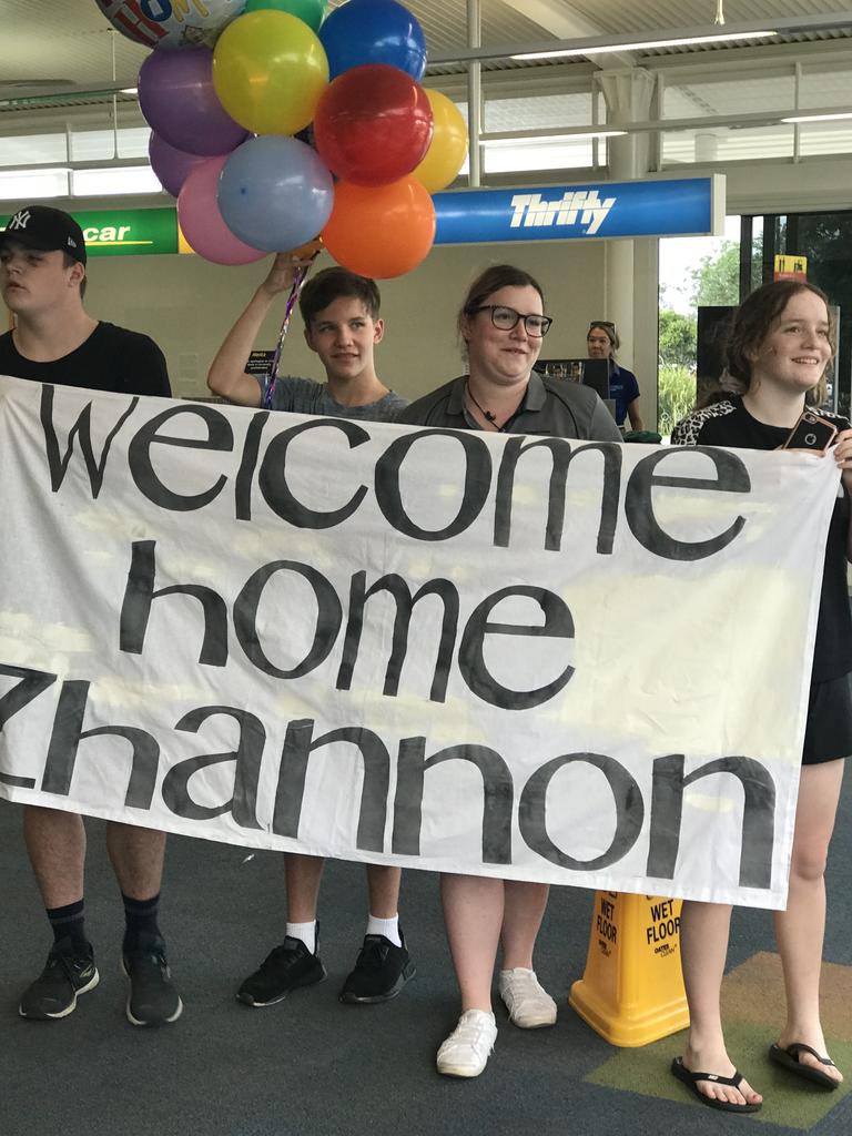 WELCOME HOME: Zhannon's family welcomed him home at the Bundaberg Airport on Friday afternoon.