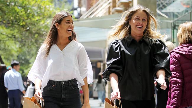 Hannah Gobran and Chloe Miller shopping in Pitt Street Mall yesterday. Picture: Tim Hunter.