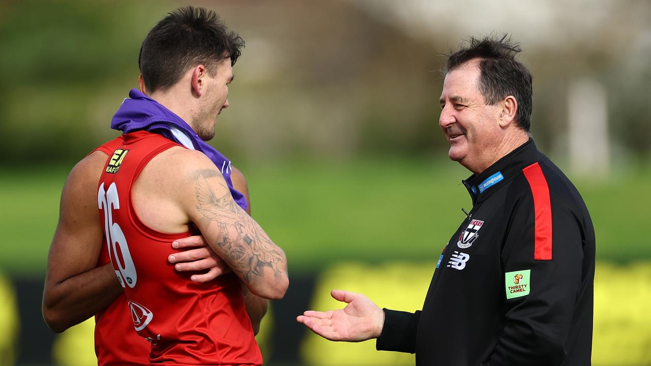 MELBOURNE, AUSTRALIA - JUNE 04: Ross Lyon, Senior Coach of the Saints speaks to Nasiah Wanganeen-Milera and Josh Battle of the Saints during a St Kilda Saints AFL training session at RSEA Park on June 04, 2024 in Melbourne, Australia. (Photo by Quinn Rooney/Getty Images)