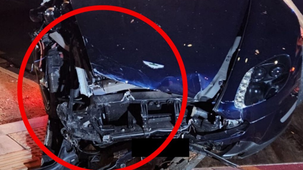 Aston Martin allegedly escapes police, demolishes car at bus stop