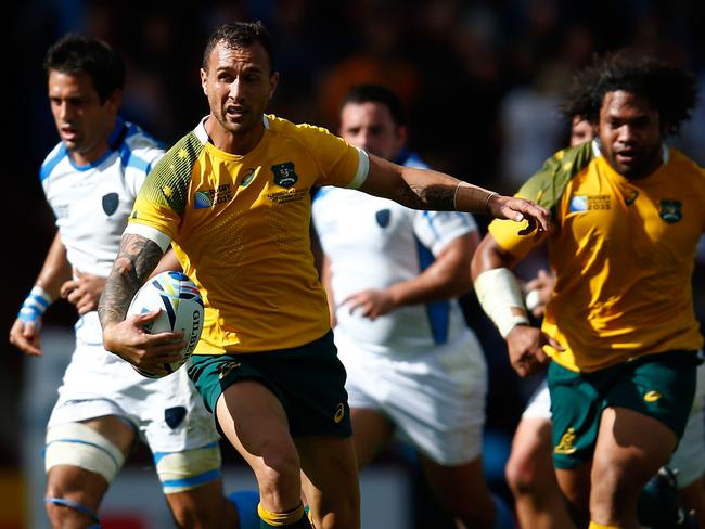 Quade Cooper breaks Uruguay’s defensive line.