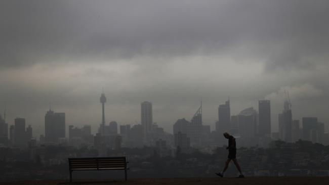 Sydney CBD waits for rain as the western suburbs get storms. Picture: John Grainger