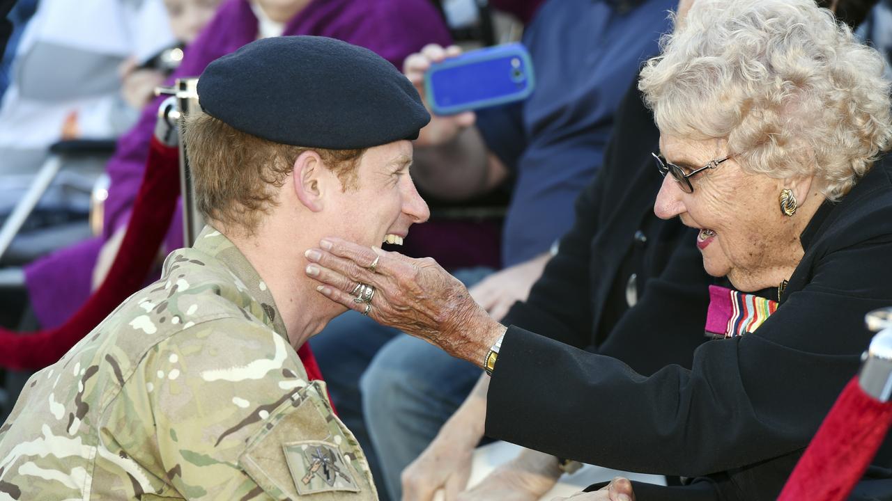 In this May 7, 2015, file photo, Britain's Prince Harry, left, talks with Australian war veteran Daphne Dunne during a visit to the Sydney Opera House in Sydney. Picture: (Dean Lewins/Pool Photo via AP, File)