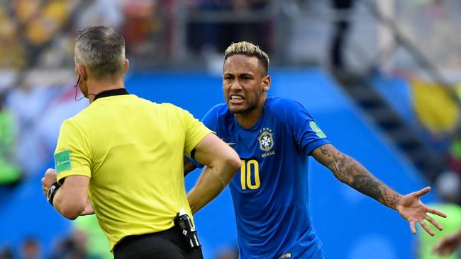 Brazil's forward Neymar (right) speaks to the Dutch referee Bjorn Kuipers during the Russia 2018 World Cup Group E football match between Brazil and Costa Rica. Photo: AFP