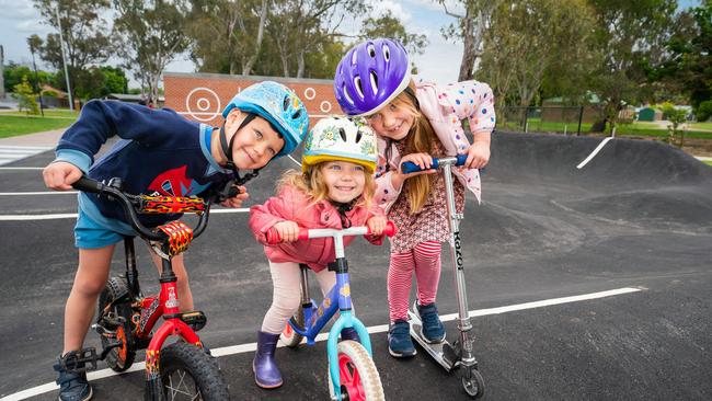 Noah (5), Mia (3) and Sophie (6) Butler enjoying Albury's new skate park.