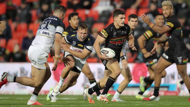 Nathan Cleary breaks through the Cowboys defence at Panthers Stadium