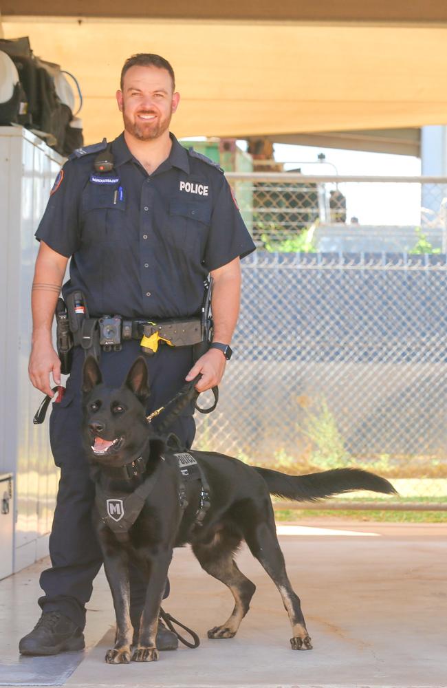 Senior Constable Matthew Houghagen and Daly (L) are part of the NT Police Dog Squad. Picture: Glenn Campbell