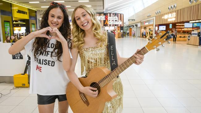 The Voice stars Ella &amp; Sienna played for fans at the airport. Picture: Roy VanDerVegt