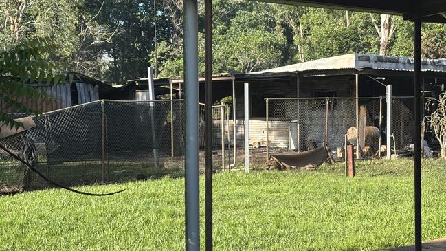 A property behind the Caltex service station in Howard Springs caught on fire. Picture: Thomas McLean