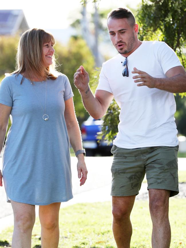 Reynolds looking happy with mum Nicole on Wednesday. Picture: Jonathan Ng