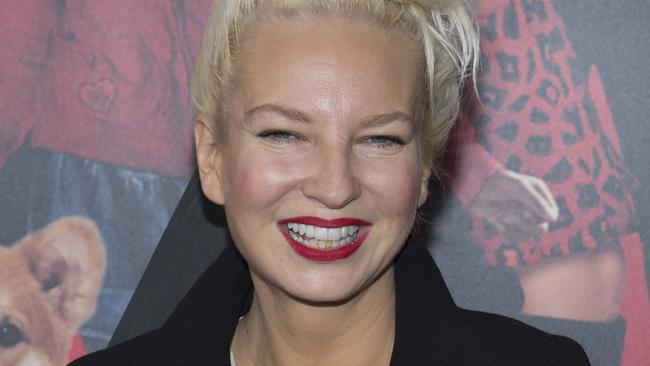 Sia attends the "Annie" premiere in New York City, held at the Ziegfeld Theater. Pictured: Sia Ref: SPL907165 071214 Picture by: Splash News Splash News and Pictures Los Angeles: 310-821-2666 New York: 212-619-2666 London: 870-934-2666 photodesk@splashnews.com