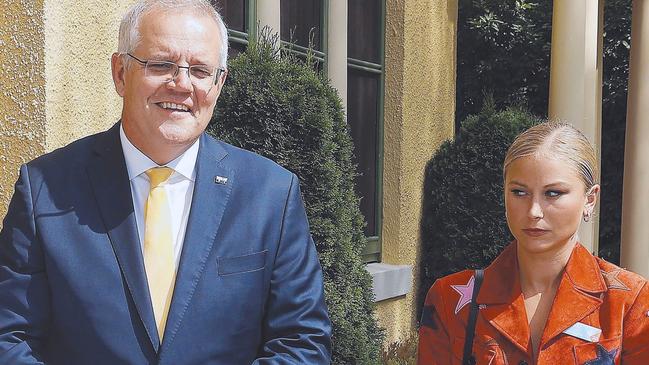 CANBERRA, AUSTRALIA NewsWire Photos JANUARY 25, 2022: Prime Minister Scott Morrison and his wife Jenny with Grace Tame, who appeared to be uncomfortable with the meeting. The PM spoke with at the 2022 Australian of the Year Finalists Morning Tea, at the Lodge in Canberra. Picture: NCA NewsWire / Gary Ramage Picture: NCA NewsWire / Gary Ramage