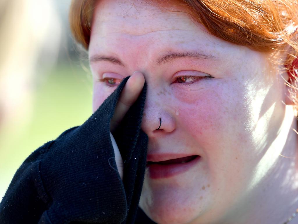 Family and friends at the scene in Caboolture where Heather Ball, a young mother of four, was fatally stabbed overnight. Picture: John Gass