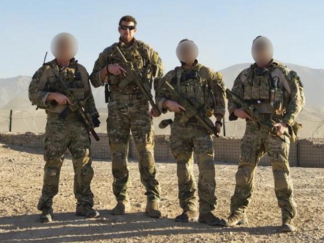 **Upsized** Embargoed for Thursday 9th June 2022 . Dt Exclusive no news.com no Australian. **LEGAL WARNING CHECK BEFORE PUBLISHING NAMES OF PEOPLE IN PHOTO* L-R Person 11, Ben Roberts-Smith, Person 56 and Person 4 pose at Tarin Kowt in October 2012.