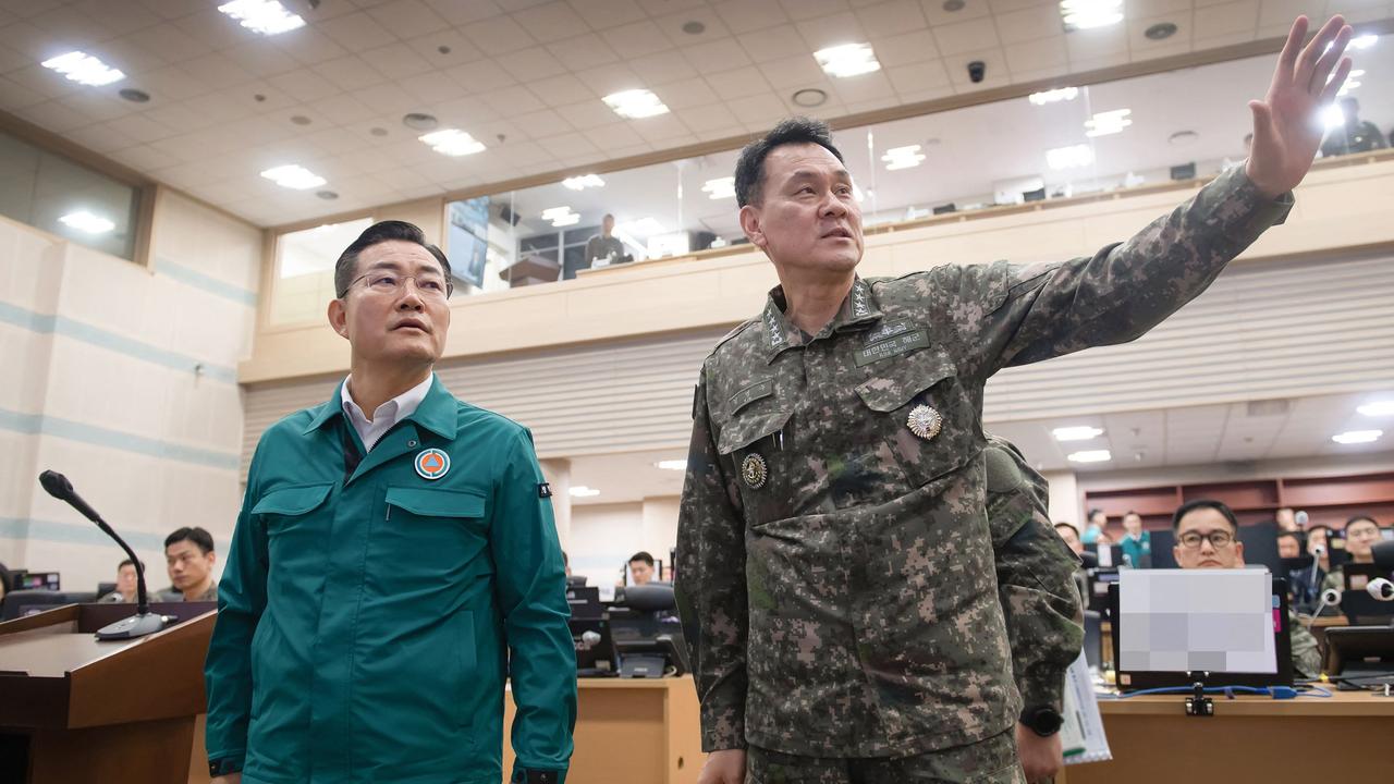 South Korean Defence Minister Shin Won-sik (L) and Joint Chiefs of Staff Chairman Admiral Kim Myung-soo (R). Picture: Handout/South Korean Defence Ministry/AFP