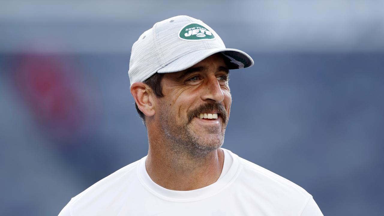 EAST RUTHERFORD, NEW JERSEY - AUGUST 19: Aaron Rodgers #8 of the New York Jets throws the ball during warmups before the first half of a preseason game against the Tampa Bay Buccaneers at MetLife Stadium on August 19, 2023 in East Rutherford, New Jersey. (Photo by Sarah Stier/Getty Images)