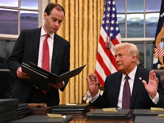 Trump signed 26 executive orders and dozens more memos, proclamations, and rules revoking his predecessor’s policies on his first day. Picture: AFP