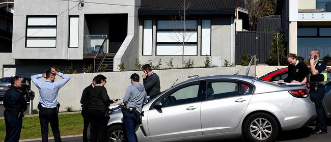 Police investigate after a man was attacked by a hammer in Church Street. Picture: Nicole Garmston