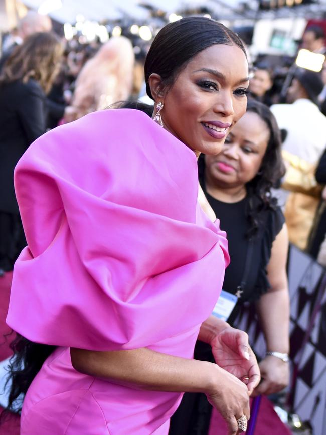 That’s a lot of pink Angela Bassett! She arrives at the Oscars. Picture: AP