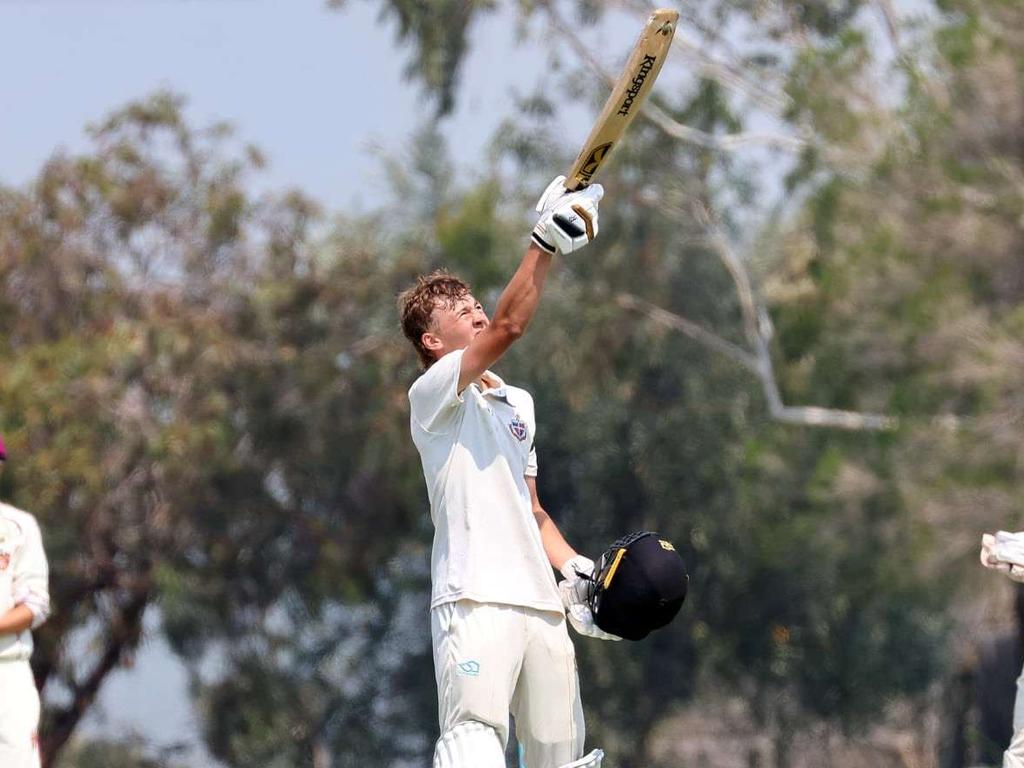 Lachie Russell raises the bat to the sky for Troy Selwood after his century. Picture: Michael Nelson/Geelong Grammar