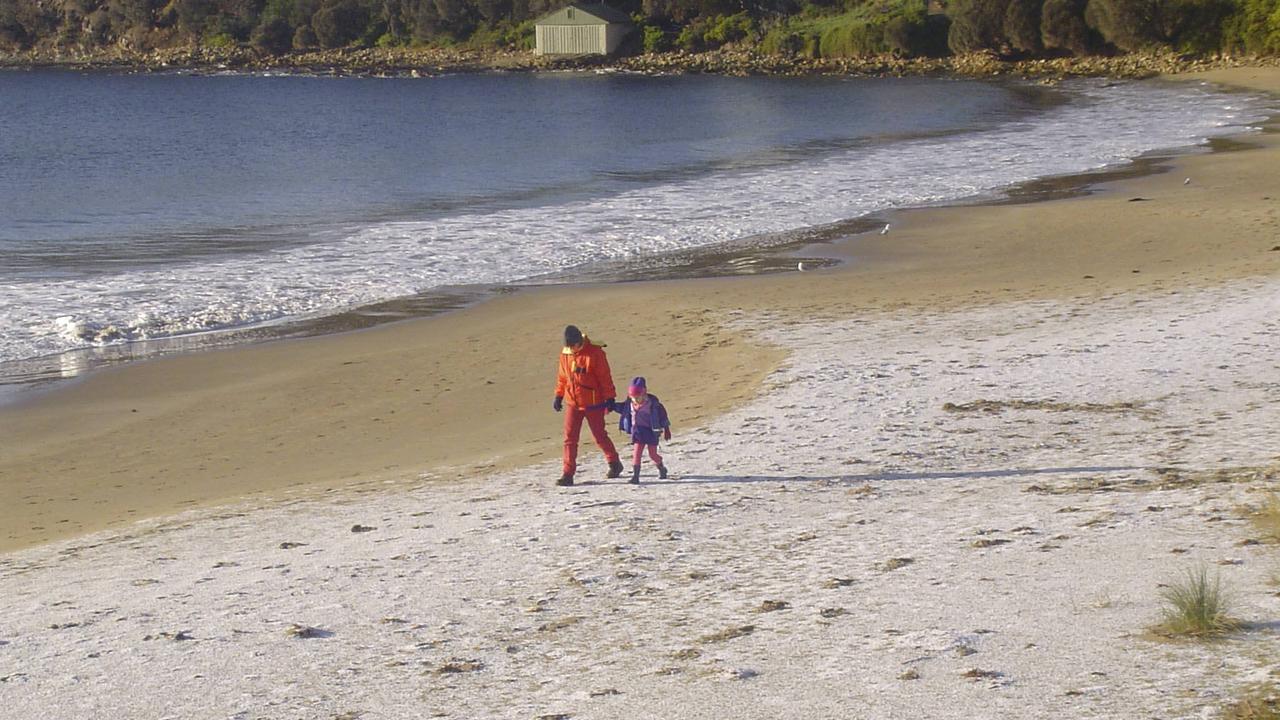 snow on Blackmans bay beach near Hobart