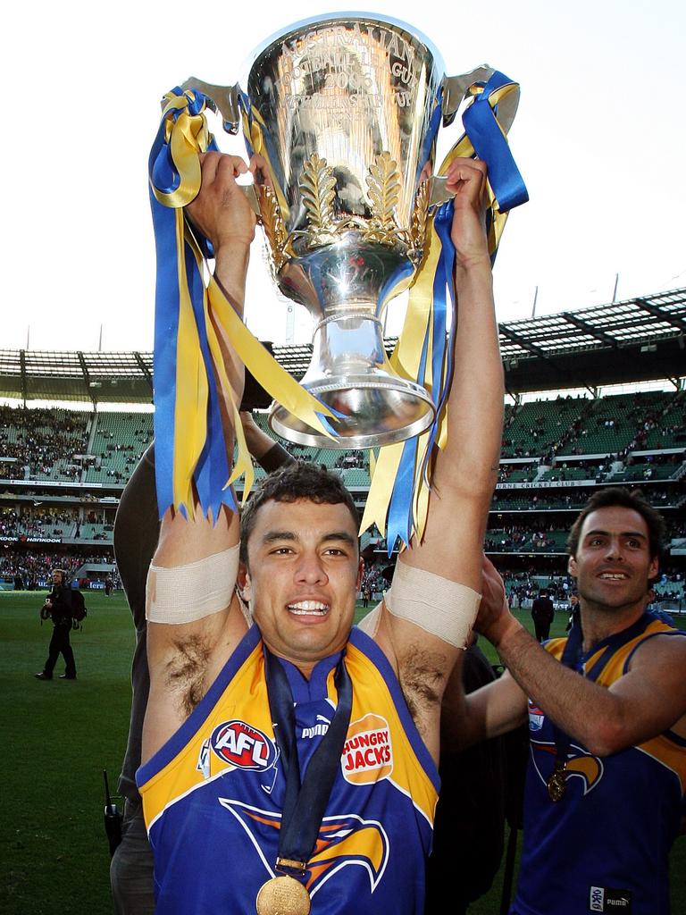 Kerr celebrates with the premiership cup.