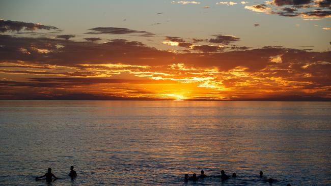 People will be cooling down at beaches such as Grange as the hot weather hits. Picture: Matt Turner