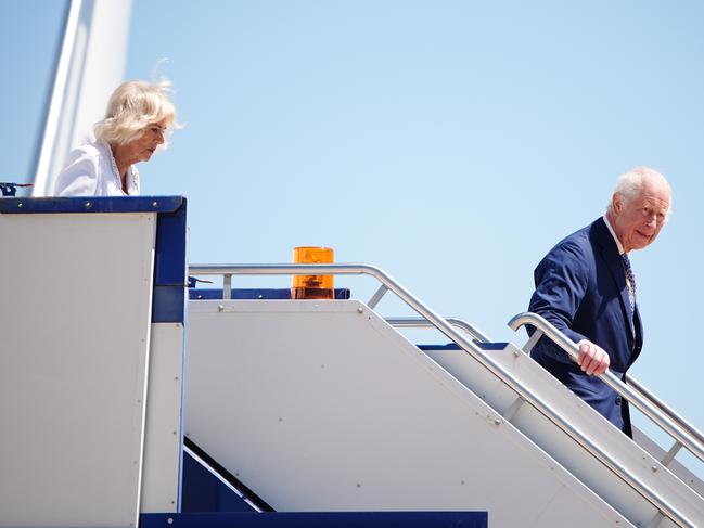 CANBERRA, AUSTRALIA - OCTOBER 21: King Charles III and Queen Camilla arrive for a visit at Canberra Airport on October 21, 2024 in Canberra, Australia. The King's visit to Australia is his first as monarch, and the Commonwealth Heads of Government Meeting (CHOGM) in Samoa will be his first as head of the Commonwealth. (Photo by Aaron Chown-Pool/Getty Images)