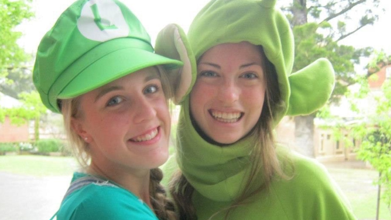 Jess Mills as a Teletubbie, right, with a friend, on her muck up day. Picture: Supplied