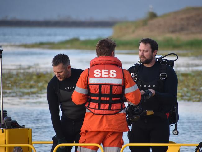 Specialist police divers searched for the body of Steve Argoon who fell into Kinchant Dam on November 2. Photo: Matthew Forrest