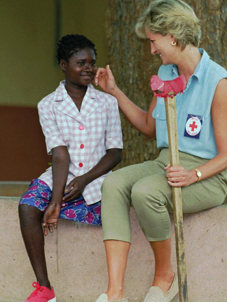 Diana, Princess of Wales, talks to amputee, 13-year-old Sandra Thijica, at the Neves Bendinha orthopaedic Workshop near Luanda, Angola. Picture: AP Photo/Joao Silva, File.