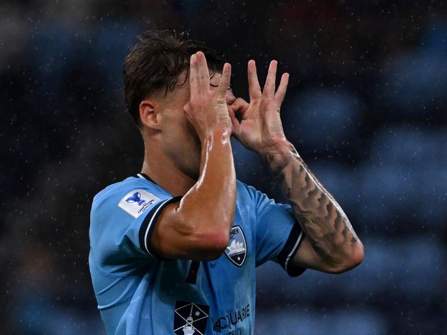 Sydney FC's Adrian Segecic celebrates scoring a goal for the Sky Blues. Picture: Saeed Khan/ AFP