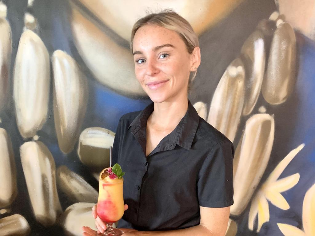 Vue Wine Bar's head bar employee Mikaela Campbell with the Mango Passionfruit Cocktail