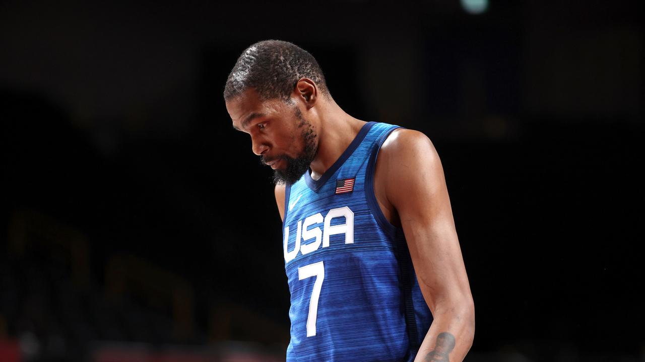 SAITAMA, JAPAN - JULY 25: Kevin Durant #7 of Team United States walks off the court with his head down after the United States lost to France in the Men's Preliminary Round Group B game on day two of the Tokyo 2020 Olympic Games at Saitama Super Arena on July 25, 2021 in Saitama, Japan. (Photo by Gregory Shamus/Getty Images)