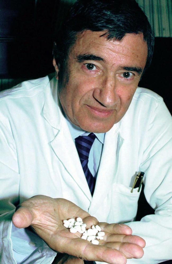 Inventor of the RU-486 abortion-inducing drug Professor Emile-Etienne Beaulieu, holds a handful of the pills in Paris, France in 1995. Picture: Supplied