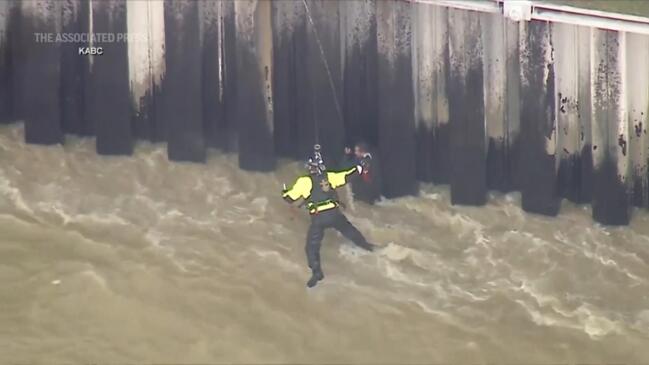 Helicopter rescues man from raging Los Angeles River