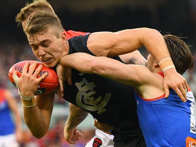 MELBOURNE, AUSTRALIA - MAY 20:  Patrick Cripps of the Blues is tackled by Jack Viney of the Demons during the round nine AFL match between the Carlton Blues and the Melbourne Demons at Melbourne Cricket Ground on May 20, 2018 in Melbourne, Australia.  (Photo by Quinn Rooney/Getty Images)