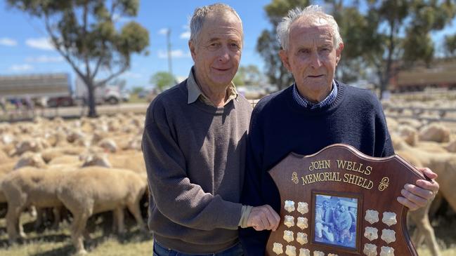 Don Bull from Irroy at Conargo, NSW, and Ross Wells from Willandra, Jerilderie, NSW, share the John Wells Memorial trophy for the highest priced pen of Merino ewes at the Jerilderie sheep sale, with both vendors selling 2022-drop ewes for $190.