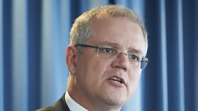 Treasurer Scott Morrison during a media conference to announce the Federal mid-year budget review. Tuesday, Dec. 15, 2015. (AAP Image/Aaron Bunch) NO ARCHIIVNG