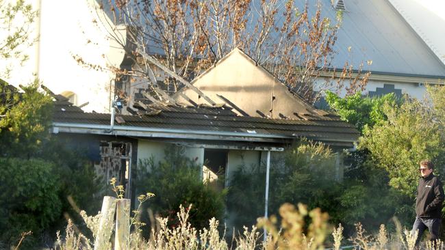 Police and City of Greater Geelong staff at the site of a building fire behind Osborne House. Picture: Alison Wynd