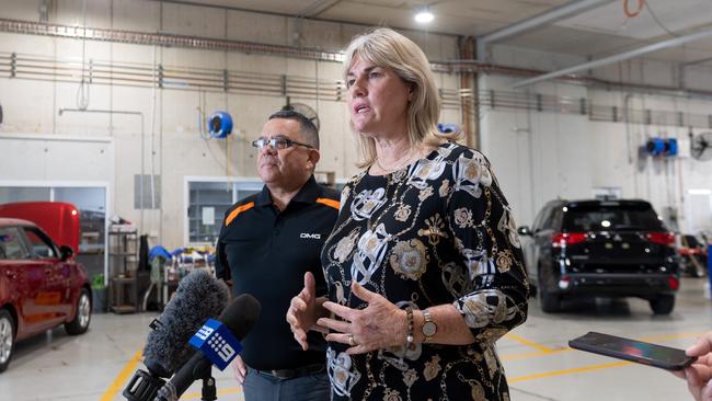 Minister for Infrastructure, Planning and Logistics Eva Lawler with Motor Group’s dealer principal Kevin Swanson. Picture: Che Chorley